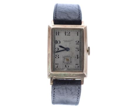 Movado 9ct rectangular cased gentleman's wristwatch, import hallmarks for London 1930, silvered dial signed Movado Chronometr