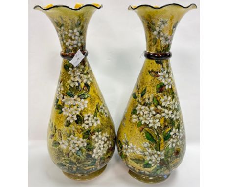 Pair of Linthorpe pottery vases in a yellow tone with floral design [damaged]