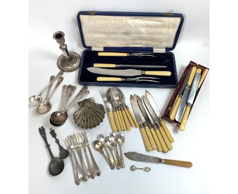 Large collection of silver plated cutlery and weighted candlestick