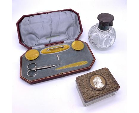 Silver topped crystal perfume bottle together with vintage yellow bakelite manicure set and cameo topped trinket dish