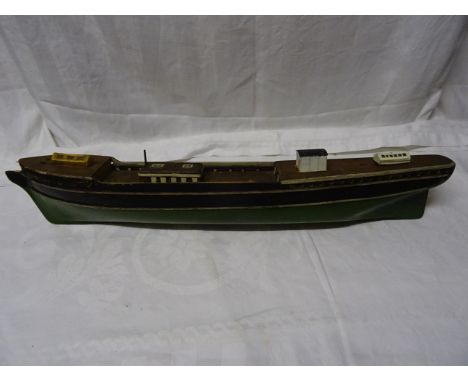 A wooden built model of a sailing vessel.  22" (56cms) long.  (incomplete)