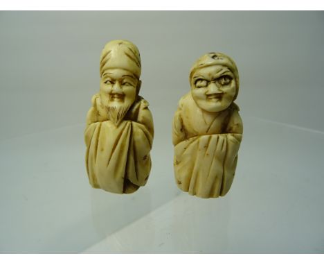 Another Japanese ivory Netsuke in the form of a bearded man and one other. 