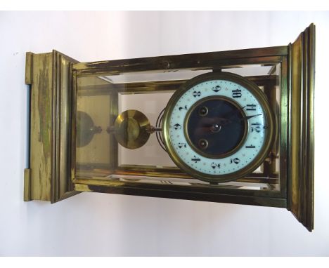 A late 19th Century four glass Mantle Clock, the 4" (10cm) white chapter ring with Arabic numerals, French movement with gong