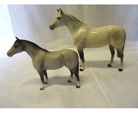 A Beswick Model of a small thoroughbred stallion No. 1992, in grey matt and another of a large thoroughbred stallion in grey 