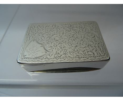 A silver oblong Snuff Box with engraved decoration and a shield shape cartouche, Birmingham, 1898, maker Joseph Gloster.  2 1