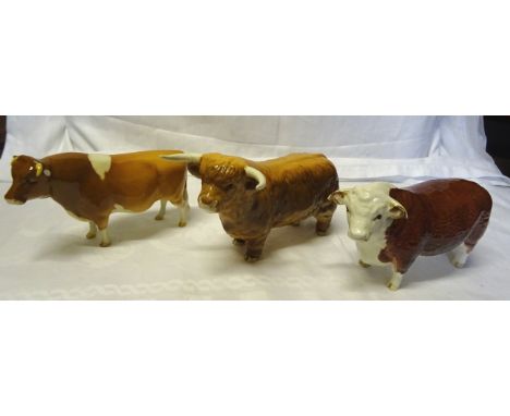 A Beswick Model of a Guernsey bull in gloss finish No. 1451 (ear chipped), a Hereford bull (ear chipped) and a Highland bull 