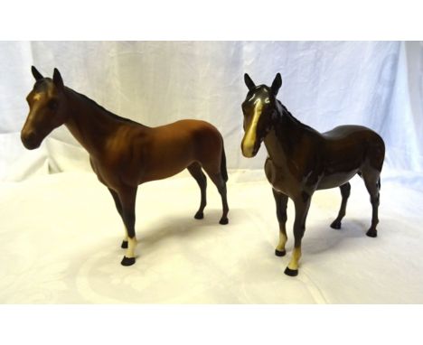 A Beswick Model of the racehorse "Bois Roussel", second version in brown gloss No. 701 and another in matt brown. 