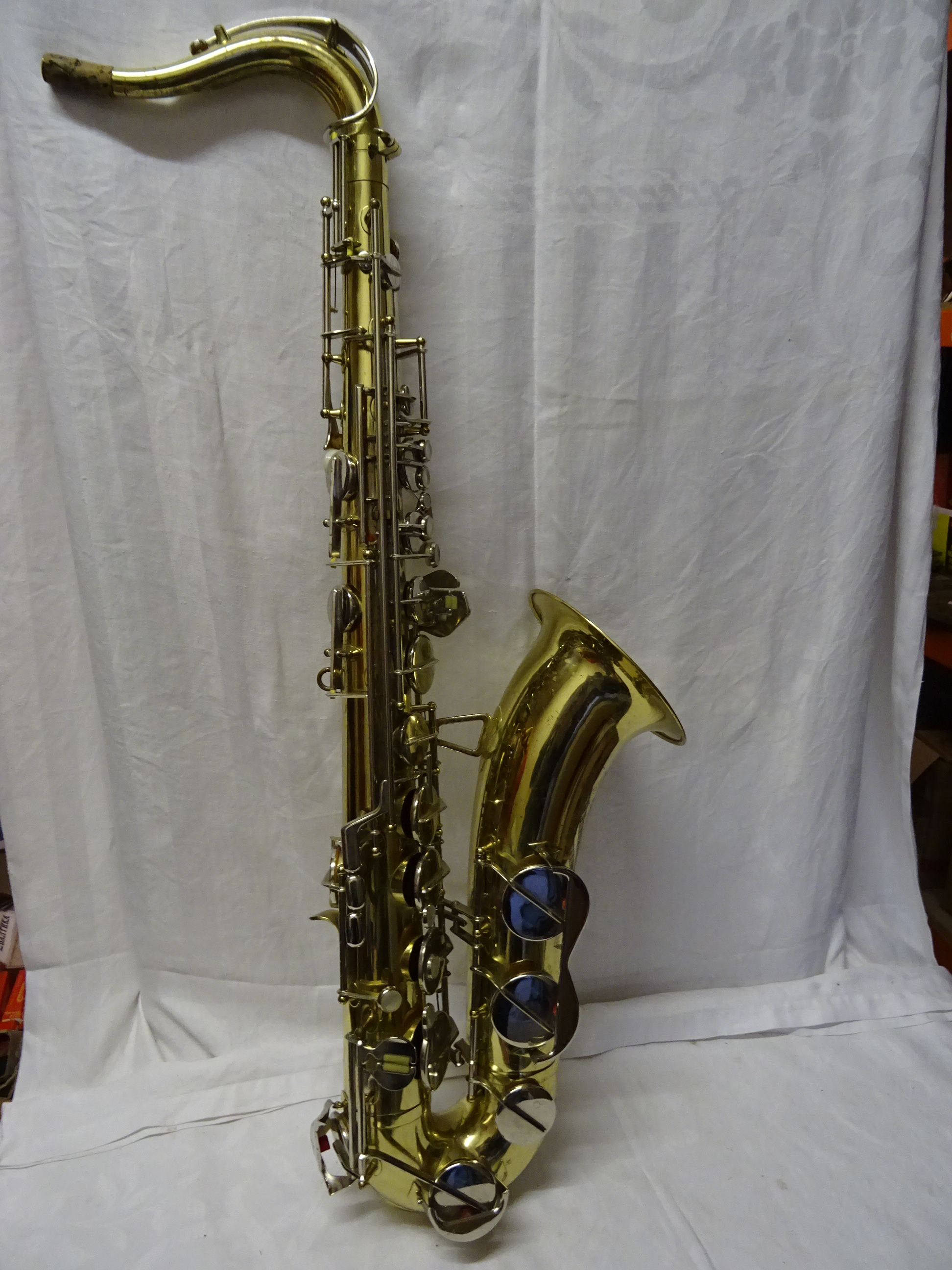 A Powertone B Flat Tenor Saxophone imported by Boosey & Hawkes, London in case.