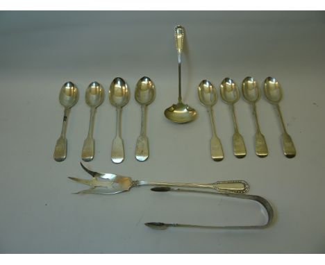 A set of six Victorian silver fiddle pattern Teaspoons, London 1880, maker George Angel, a sterling silver three pronged pick