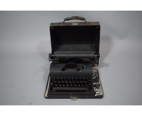 A Vintage Metal Cased Portable Typewriter 