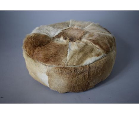 A Vintage Circular Animal Skin Pouffe, 38cms Diameter 