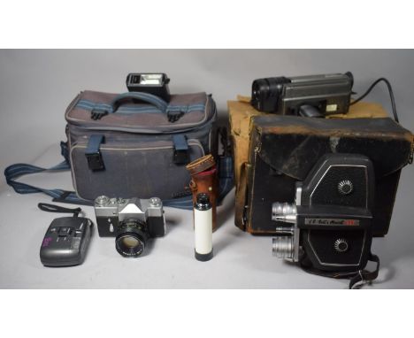 A Clockwork Bell and Howell 8mm Cine Camera, a Sharp Camcorder and a 35mm Mamiya Set 