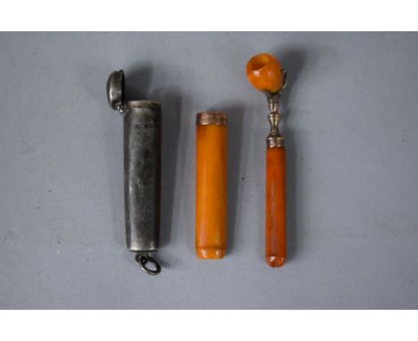 A 9 Carat Gold and Amber Cheroot Holder in Silver Case and an Amber and White Metal Opium Pipe 