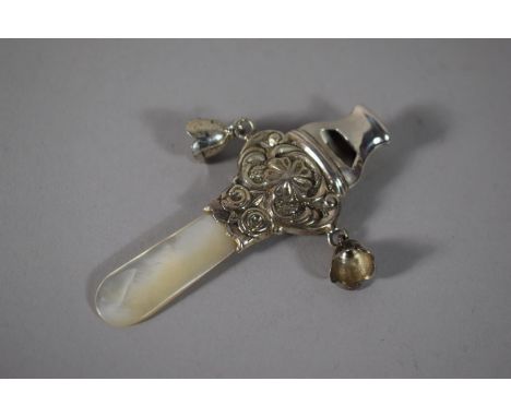 A Mother of Pearl Handled Silver Rattle and Whistle, 8.5cms Long 