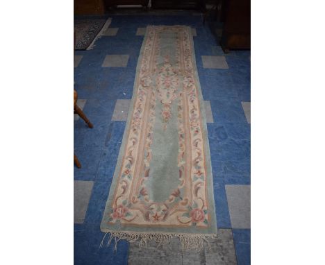 A Patterned Chinese Woollen Runner, 305 x 70cms 