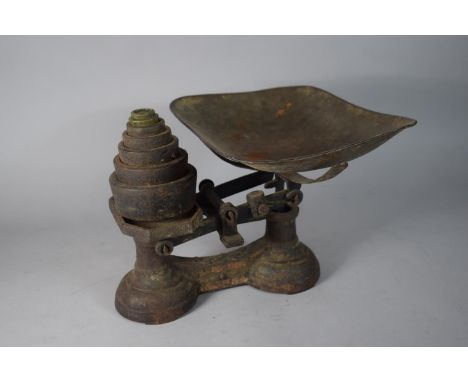 A Set of Vintage Cast Iron Scales and Weights 