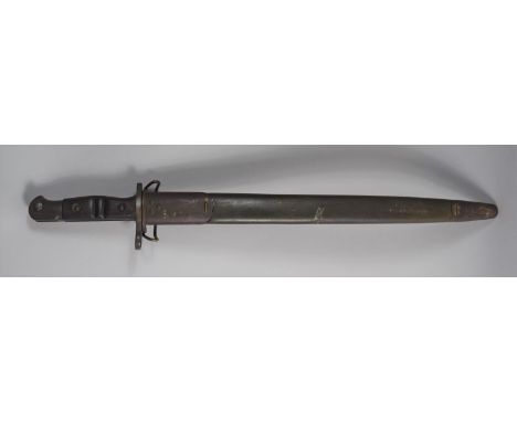 A Remington WWI Bayonet with Wooden Handle and Leather Scabbard 