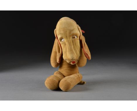 A Norah Wellings Bones dog 1930s, of beige velvet, white, orange and black googly glass eyes set into half-moon cuts in the f