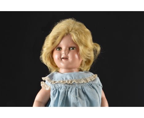 An Ideal Shirley Temple doll, composition with sleeping eyes, blonde mohair wig, original clothes and a later blue dress - 17