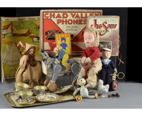 Quantity of toys: including a Chad Valley Phones, in original box; nice teaching aid posters; a wooden clown riding a donkey 