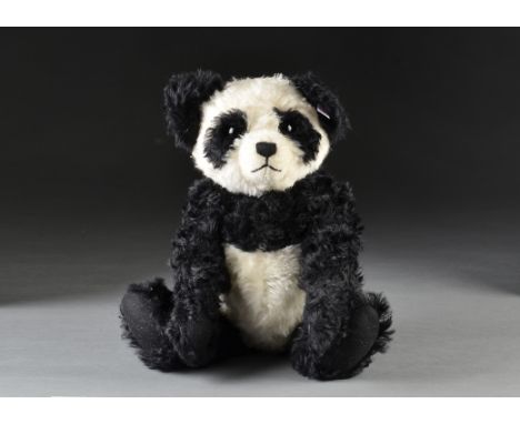 A Steiff Limited Edition Panda bear, 84 of 2000, in original box with certificate, 2003