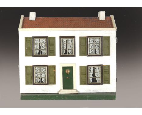 A Tri-ang dolls’ house DH/2 1928/9, with central front door with lion knocker, tinplate windows with green card shutters, pap