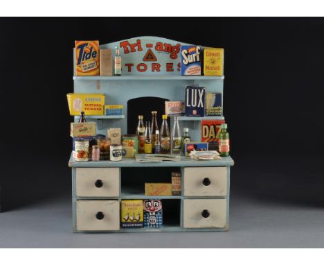 A Tri-ang Stores, a blue painted shop counter with drawers, transfer label and a quantity of toy groceries - 121?4in. (31cm.)