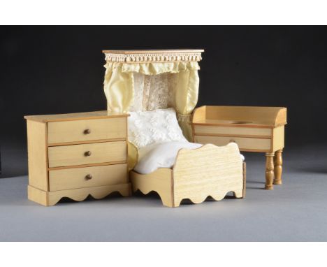 A German blonde wood bedroom set, comprising half tester bed - 71?2in. (19cm.) high (foot board replaced); a chest of drawers