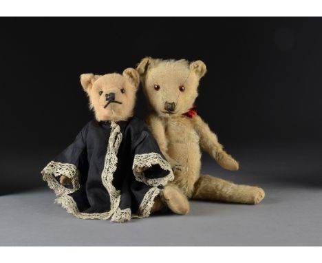 A Chiltern-type teddy bear 1930s, with golden mohair, orange and black glass eyes, pronounced muzzle, black stitched nose, sw