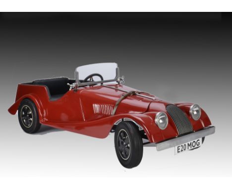 A Hamilton Brooks Co Morgan 4 + 4 child’s pedal car, fibreglass body, metal frame, working headlights and Pifco horn, single 