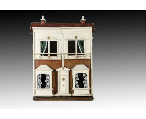 A G & J Lines dolls’ house No.20 1909/10, brick paper and cream painted, central front door with lion mask door knocker, two 