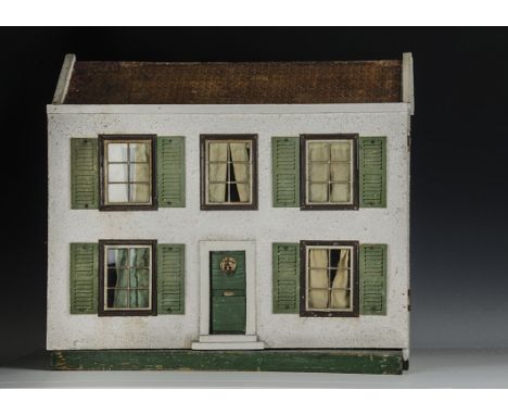 A G & J Lines 1919 dolls’ house, with pebble-dashed exterior, tinplate windows with cardboard shutters, front door with lion 