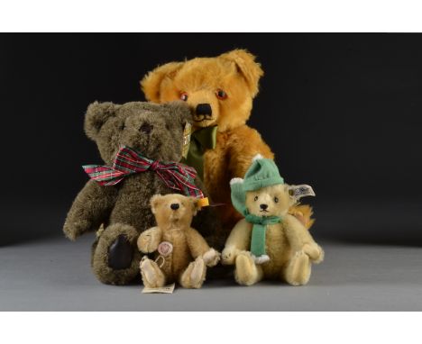 Four manufactured teddy bears: a small Steiff with white tag 0163/19; another Historic Steiff Miniature Cinnamon Bar (damaged