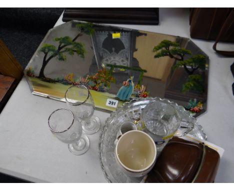 A vintage painted garden mirror together with glassware and a vintage Agfa camera