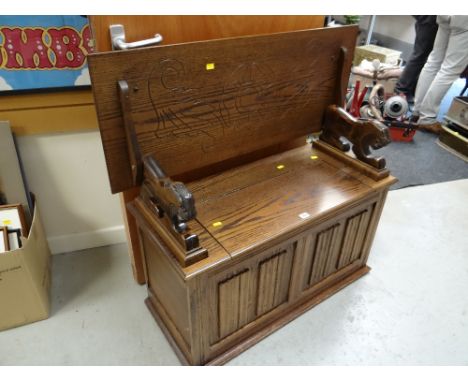 A good linen fold monk's bench with box seat