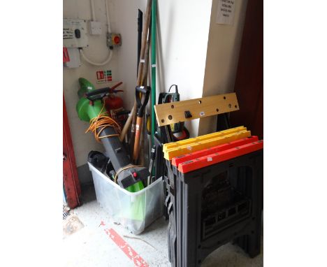 A quantity of items from the garage part of a house clearance including garden blower, garden tools, trestles etc
