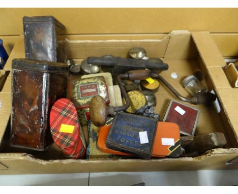 A collection of vintage display tins and three vintage carpenters tools