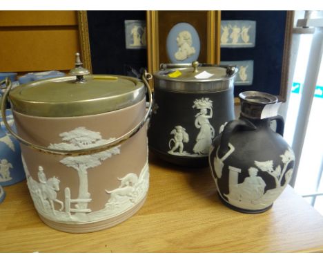 Two items of black Wedgwood Jasperware with EPNS lid and handle, similar decanter with silver collar and another biscuit barr