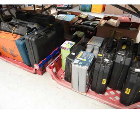 A large quantity of garage clearance items including cased sets of power tools and toolboxes with contents, packaged househol
