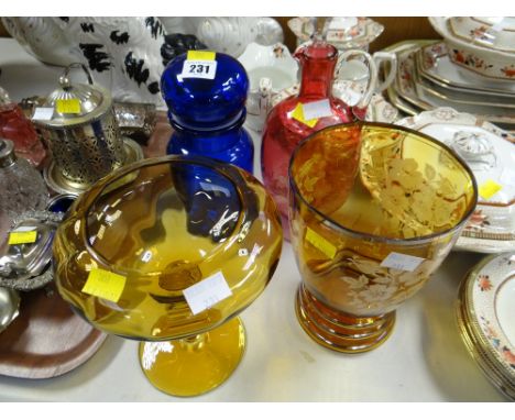 Four items of glassware including believed Mary Gregory decorated cranberry decanter