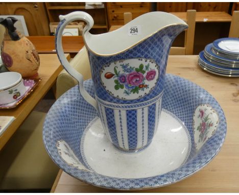 A decorative blue and white jug and basin set 