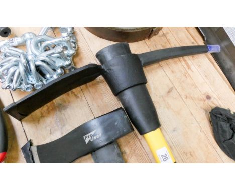 A pick axe with fibre glass shaft 