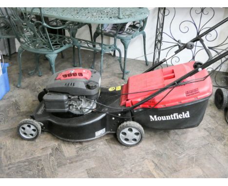 A Mountfield petrol engine self propelled rotary motor mower with grass container 