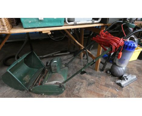 An electric self propelled consort 14 cylinder lawnmower with roller 