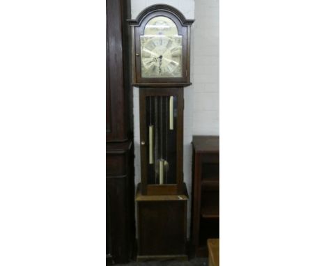 A reproduction oak cased grandfather clock with brass dial and weights with glazed door 