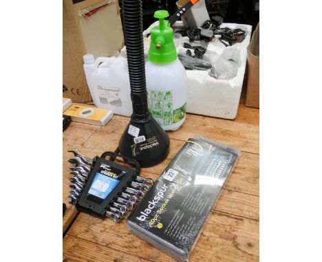 A new 40 piece socket wrench set and a new 8 piece combination spanner set, a 1 1/2 litre pressure sprayer, a two in one funn