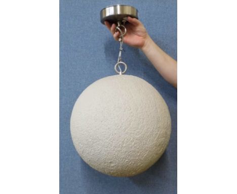 A Moon shaped ceiling light shade 
