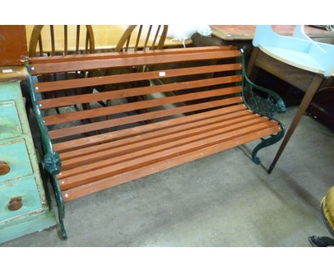 A painted cast alloy ended garden bench 