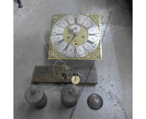 An 18th Century John Baddely of Tong 8-day brass longcase clock dial and movement, with pendulum and weights 