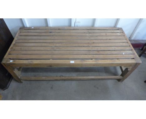 An oak changing room bench 